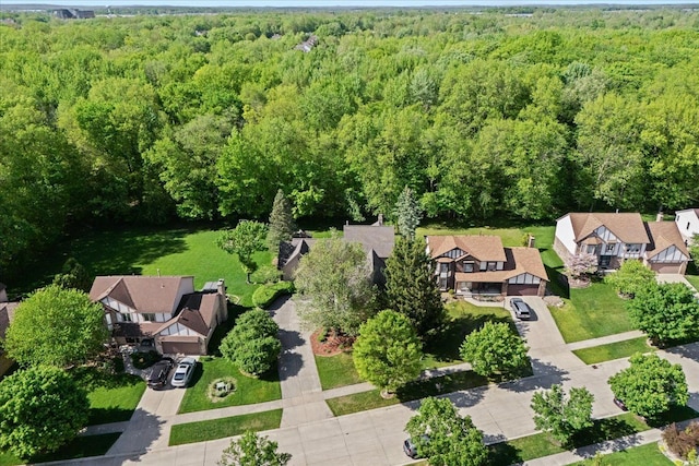 46890 Cider Mill Dr, Novi, MI 48374 - aerial view of property and surrounding area with a forest and nearby suburban area