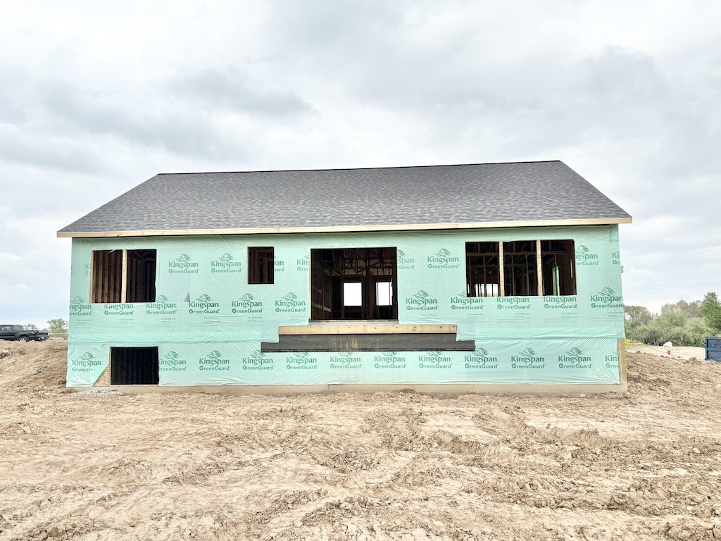 8296 Kettle Oak Dr SE, Alto, MI 49302 - back of house featuring roof with shingles