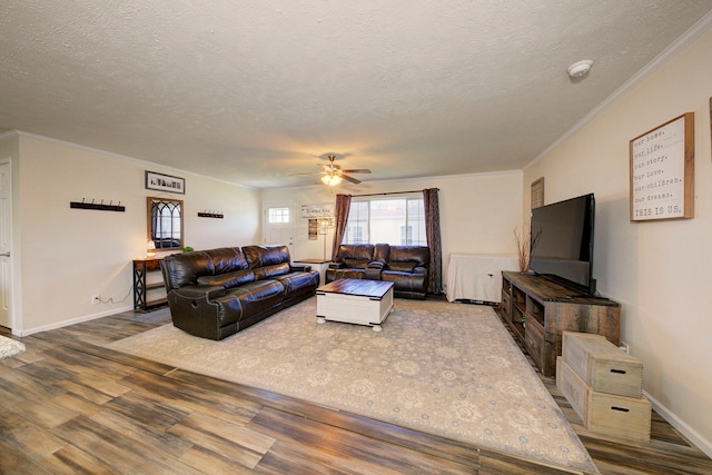 6418 Apple Way, Fenton, MI 48430 - living area with crown molding, a textured ceiling, wood finished floors, ceiling fan, and baseboards