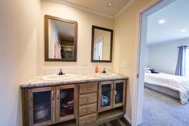 6418 Apple Way, Fenton, MI 48430 - bathroom featuring crown molding, ensuite bath, double vanity, decorative backsplash, and recessed lighting