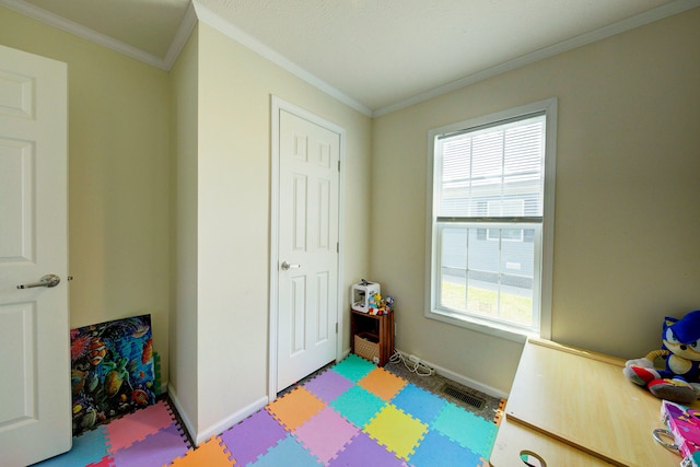 6418 Apple Way, Fenton, MI 48430 - recreation room featuring healthy amount of natural light, crown molding, baseboards, and tile patterned floors