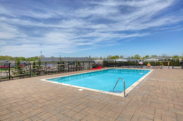 6418 Apple Way, Fenton, MI 48430 - community pool with fence and a patio area