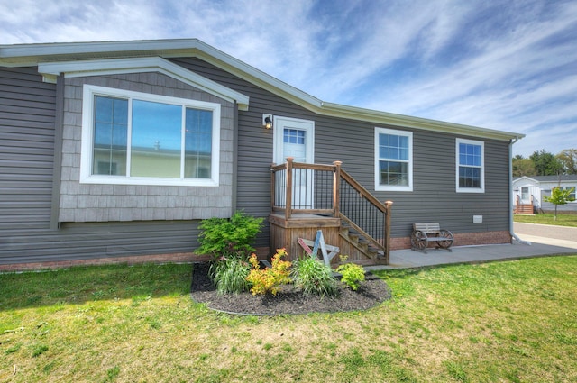 6418 Apple Way, Fenton, MI 48430 - back of house featuring a yard and a patio area
