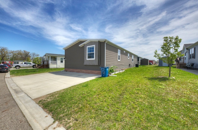 6418 Apple Way, Fenton, MI 48430 - view of home's exterior with a yard