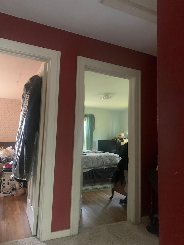hall with wood finished floors