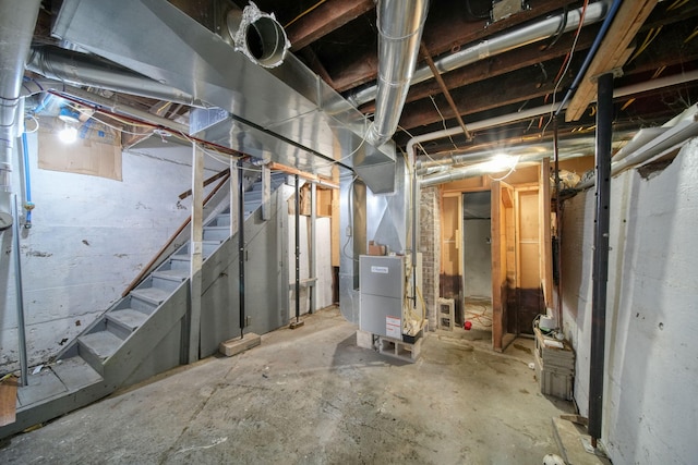 1702 Teneyck St, Jackson, MI 49203 - unfinished below grade area with heating unit and stairs
