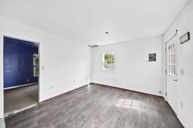 1702 Teneyck St, Jackson, MI 49203 - unfurnished room with wood finished floors and baseboards