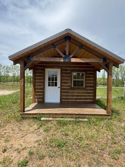 view of outbuilding with an outdoor structure