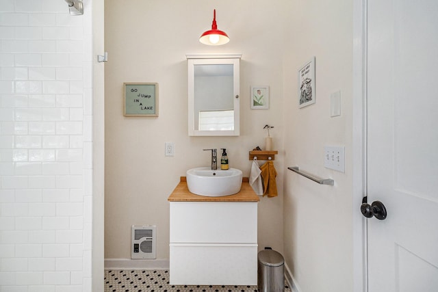 371 4th St, Pentwater, MI 49449 - bathroom featuring vanity and baseboards