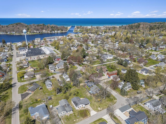 371 4th St, Pentwater, MI 49449 - aerial view of property and surrounding area featuring a nearby body of water and nearby suburban area