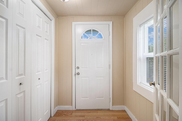 2335 Holmes Rd, Ypsilanti, MI 48198 - entrance foyer featuring light wood-style flooring, ornamental molding, and baseboards