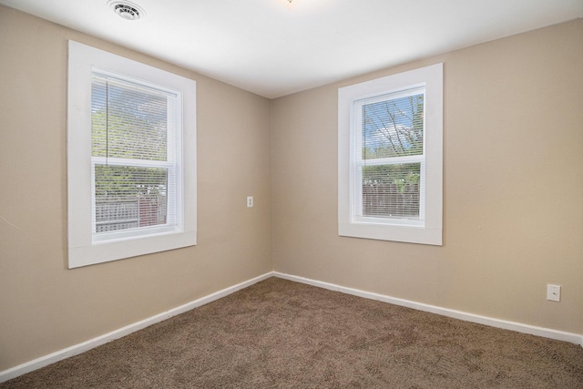 2335 Holmes Rd, Ypsilanti, MI 48198 - spare room featuring carpet and baseboards