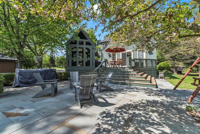 2462 N Dixboro Rd, Ann Arbor, MI 48105 - view of patio / terrace with a deck, outdoor dining space, and stairs