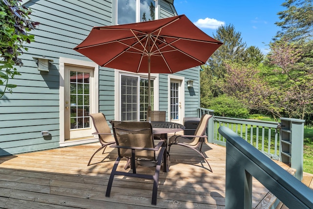 2462 N Dixboro Rd, Ann Arbor, MI 48105 - wooden terrace with outdoor dining space