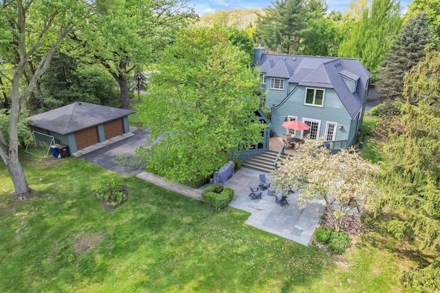 2462 N Dixboro Rd, Ann Arbor, MI 48105 - aerial view of property and surrounding area with a heavily wooded area