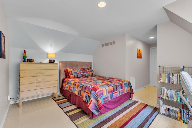 2462 N Dixboro Rd, Ann Arbor, MI 48105 - bedroom with light wood-style flooring, recessed lighting, baseboards, and lofted ceiling