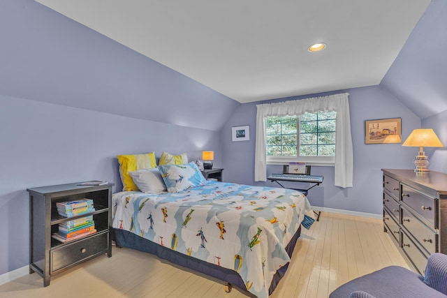 2462 N Dixboro Rd, Ann Arbor, MI 48105 - bedroom featuring vaulted ceiling, baseboards, wood-type flooring, and recessed lighting