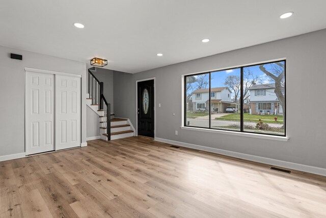 29244 Marshall St, Southfield, MI 48076 - entryway featuring wood finished floors, baseboards, stairway, and recessed lighting