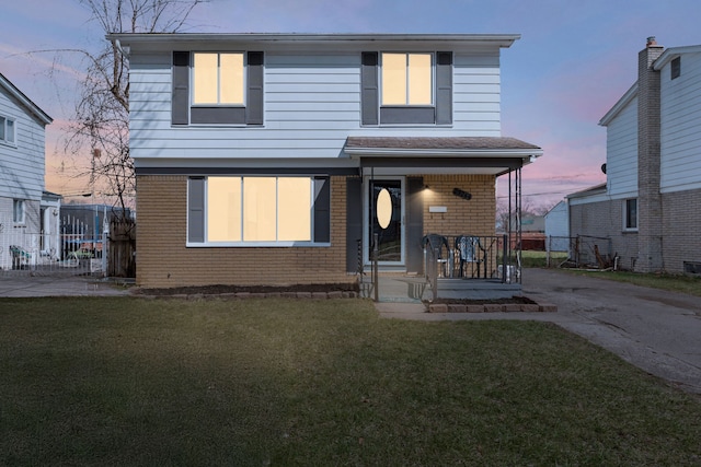 29244 Marshall St, Southfield, MI 48076 - view of front of house featuring brick siding, covered porch, and concrete driveway