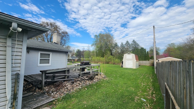 38120 Winkler St, Harrison Township, MI 48045 - view of yard with a storage unit and an outbuilding