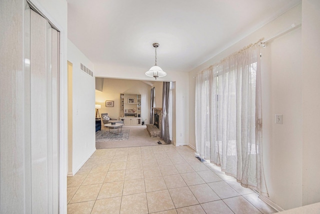 3049 Turnberry Ln, Ann Arbor, MI 48108 - hall with light tile patterned flooring, light colored carpet, and baseboards