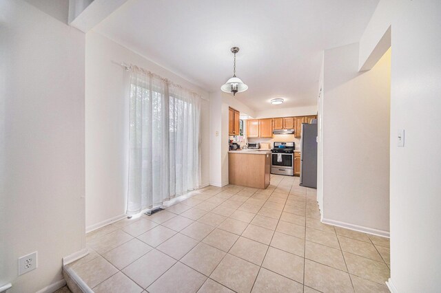 3049 Turnberry Ln, Ann Arbor, MI 48108 - kitchen with appliances with stainless steel finishes, light countertops, baseboards, and light tile patterned floors
