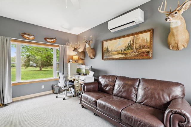 75349 12th Ave, South Haven, MI 49090 - carpeted living room featuring a wall mounted air conditioner, a desk, and baseboards