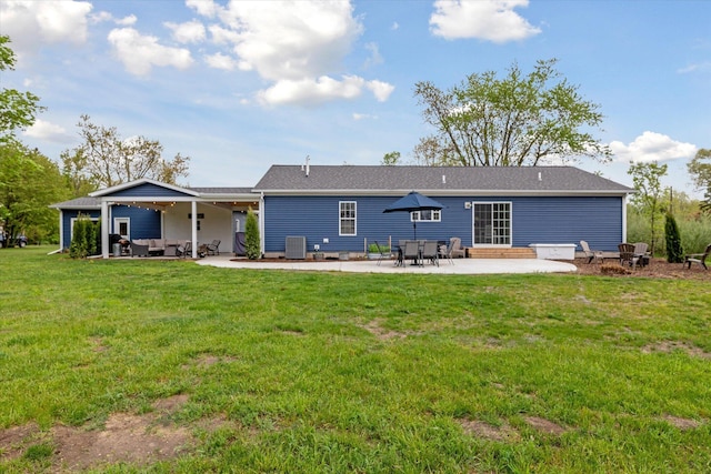 75349 12th Ave, South Haven, MI 49090 - back of property with a patio, central AC unit, outdoor lounge area, and a yard