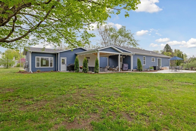 75349 12th Ave, South Haven, MI 49090 - back of house featuring a patio and a yard