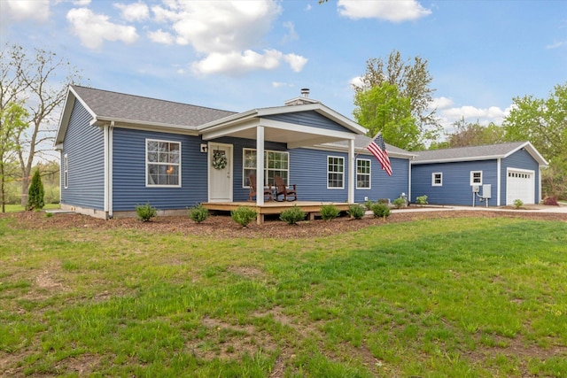 75349 12th Ave, South Haven, MI 49090 - single story home featuring a front yard, an outdoor structure, a detached garage, and roof with shingles
