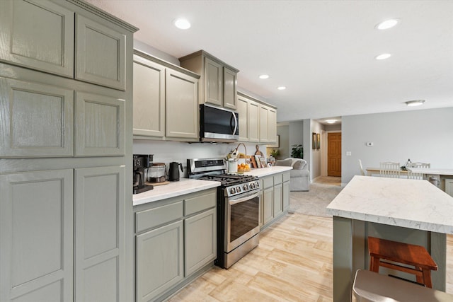 75349 12th Ave, South Haven, MI 49090 - kitchen with stainless steel appliances, gray cabinetry, recessed lighting, and light countertops