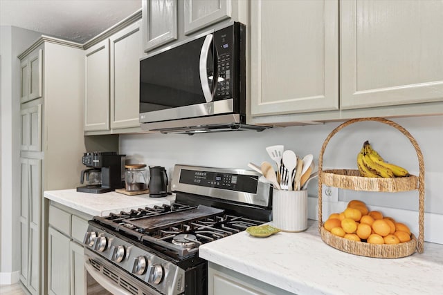 75349 12th Ave, South Haven, MI 49090 - kitchen with stainless steel appliances and light stone countertops