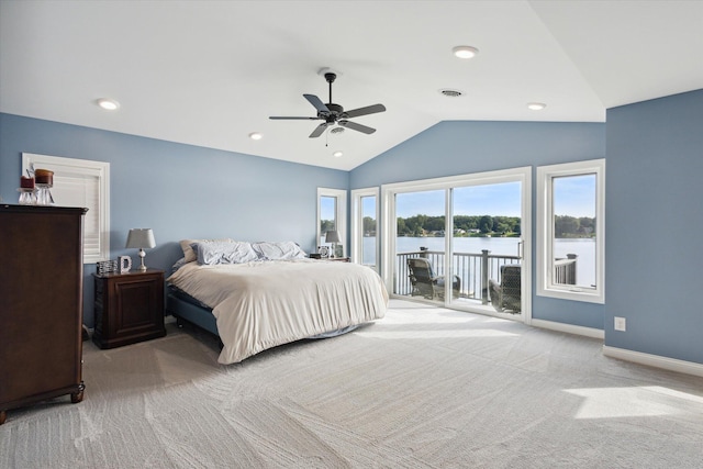 292 Lyon Lake Rd, Marshall, MI 49068 - bedroom featuring carpet flooring, access to exterior, lofted ceiling, baseboards, and a water view