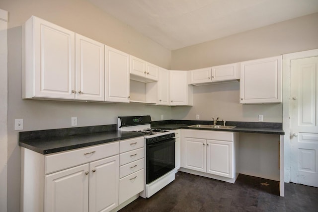 811 Park St SW, Grand Rapids, MI 49504 - kitchen featuring range with gas cooktop, a sink, white cabinets, and dark countertops