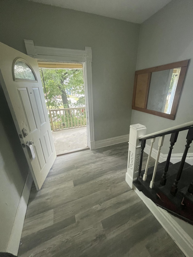 811 Park St SW, Grand Rapids, MI 49504 - entrance foyer with wood finished floors, baseboards, and stairs