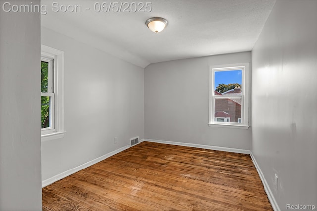 15285 Hazelridge St, Detroit, MI 48205 - unfurnished room with wood finished floors and baseboards