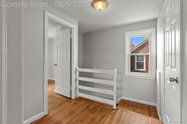 15285 Hazelridge St, Detroit, MI 48205 - corridor with baseboards and wood finished floors