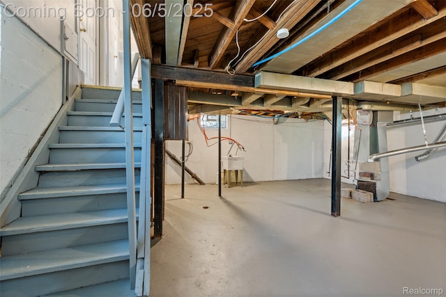 15285 Hazelridge St, Detroit, MI 48205 - unfinished basement with heating unit, stairs, and a sink