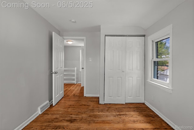 15285 Hazelridge St, Detroit, MI 48205 - unfurnished bedroom featuring wood finished floors, baseboards, and a closet