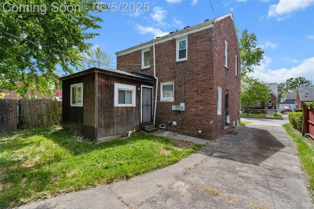 15285 Hazelridge St, Detroit, MI 48205 - back of property with entry steps and brick siding