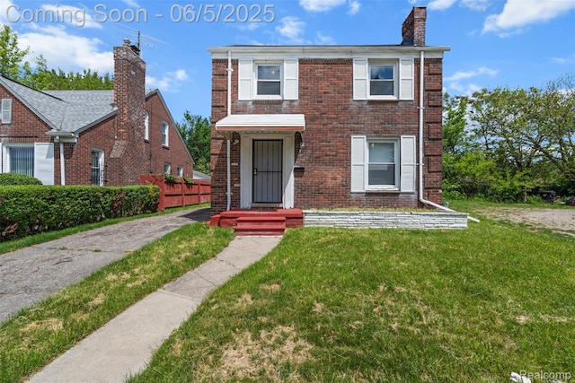 15285 Hazelridge St, Detroit, MI 48205 - view of front of home with brick siding and a chimney