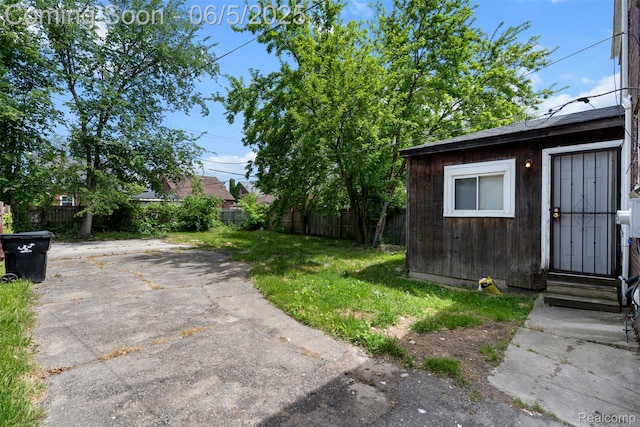 15285 Hazelridge St, Detroit, MI 48205 - view of yard with entry steps and a patio
