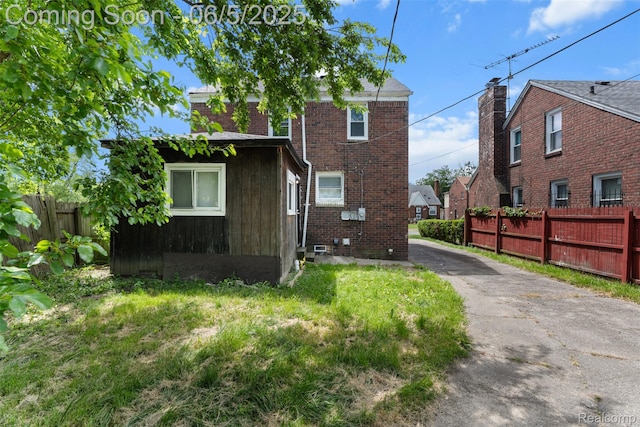 15285 Hazelridge St, Detroit, MI 48205 - view of home's exterior with brick siding