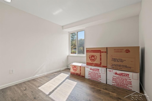 2119 Bayliss St, Midland, MI 48640 - empty room with wood finished floors and baseboards