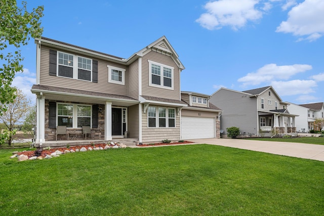 1579 Red Stem Dr, Holland, MI 49424 - view of front of house with a porch, concrete driveway, stone siding, and a front lawn