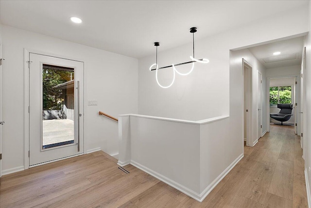 7044 Cascade Rd SE, Grand Rapids, MI 49546 - doorway to outside with light wood-type flooring and recessed lighting