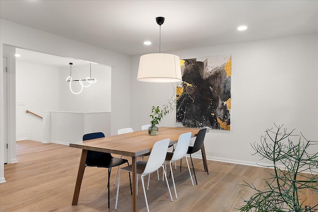 7044 Cascade Rd SE, Grand Rapids, MI 49546 - dining area featuring light wood-style flooring and recessed lighting
