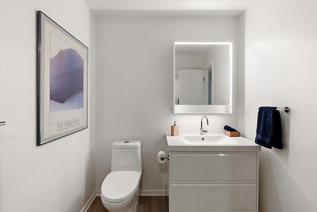 7044 Cascade Rd SE, Grand Rapids, MI 49546 - bathroom featuring vanity and toilet