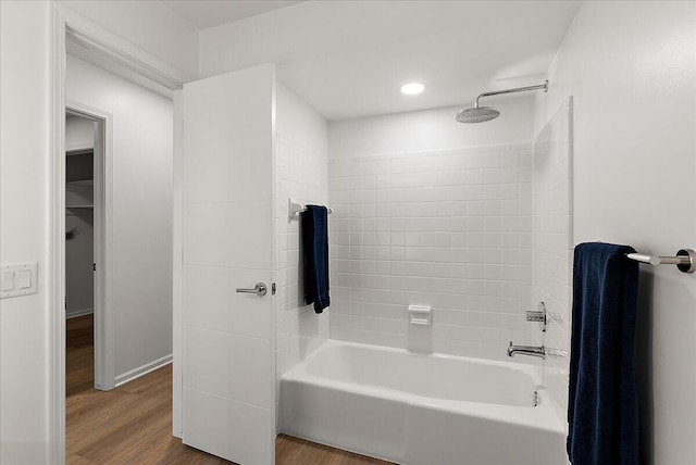 7044 Cascade Rd SE, Grand Rapids, MI 49546 - bathroom featuring bathing tub / shower combination, wood finished floors, and recessed lighting