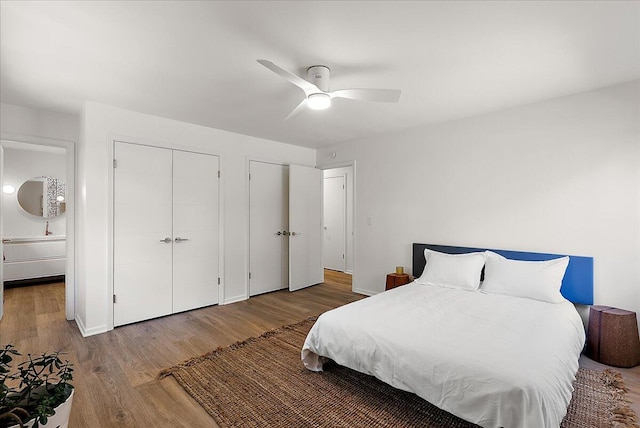 7044 Cascade Rd SE, Grand Rapids, MI 49546 - bedroom with wood finished floors, a ceiling fan, and a closet